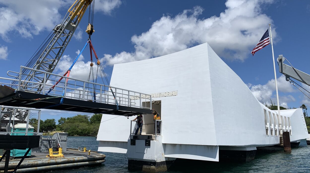 Photo of crane setting a bridge at the USS Arizona Memorial in Pearl Harbor, Hawaii