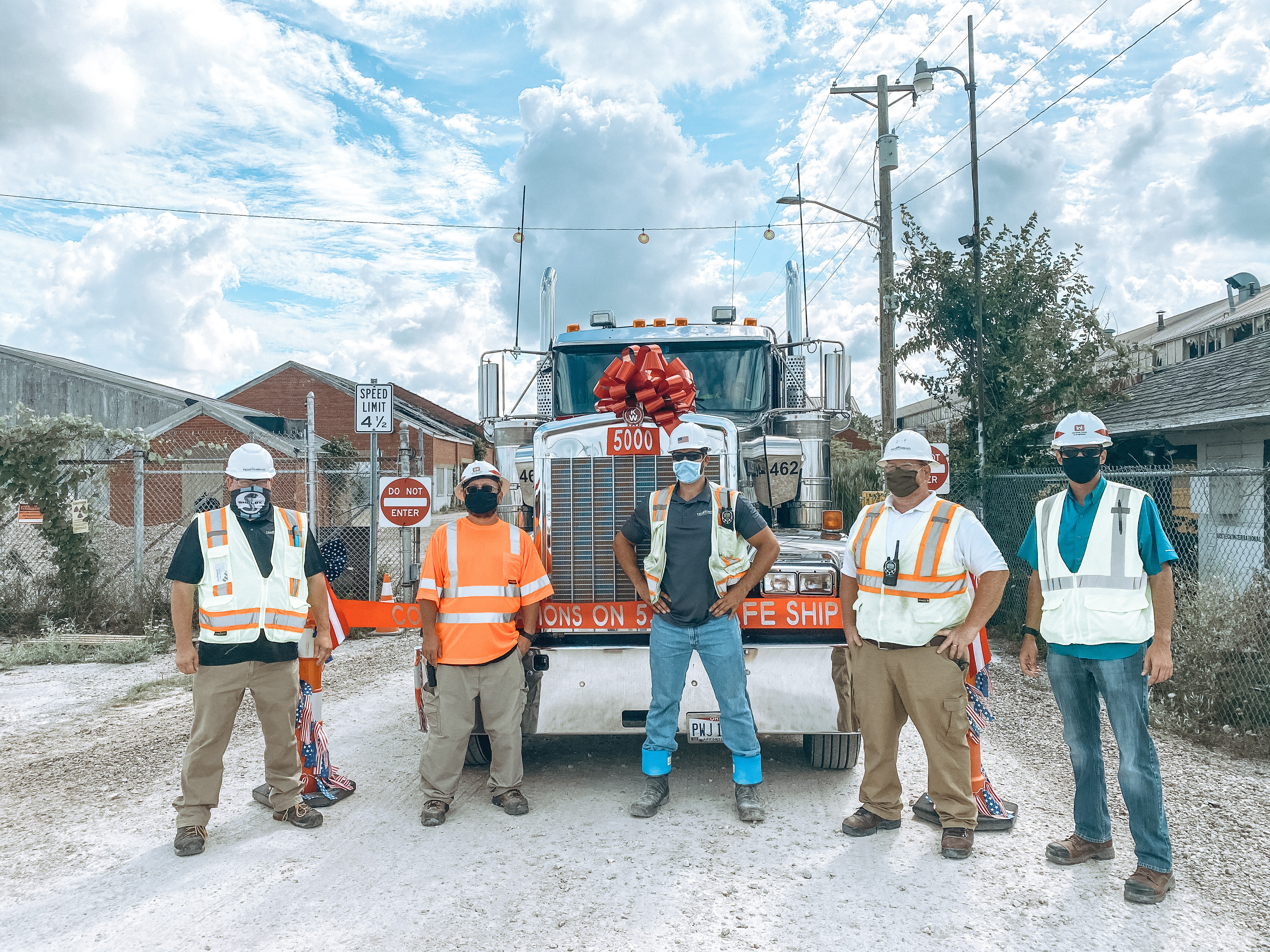 Members of the 5,000th load celebration