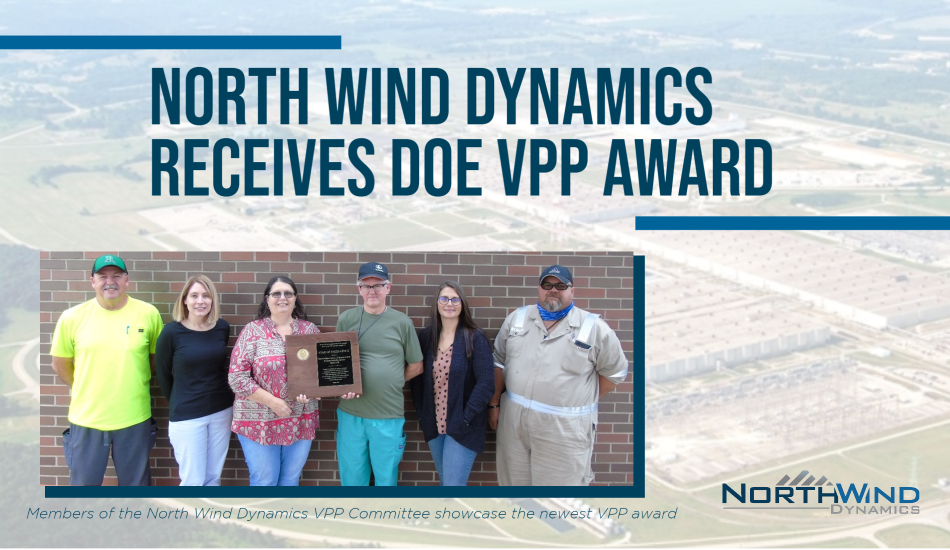 Image with employees holding award. Texts says North Wind Synamics Receives DOE VPP Award