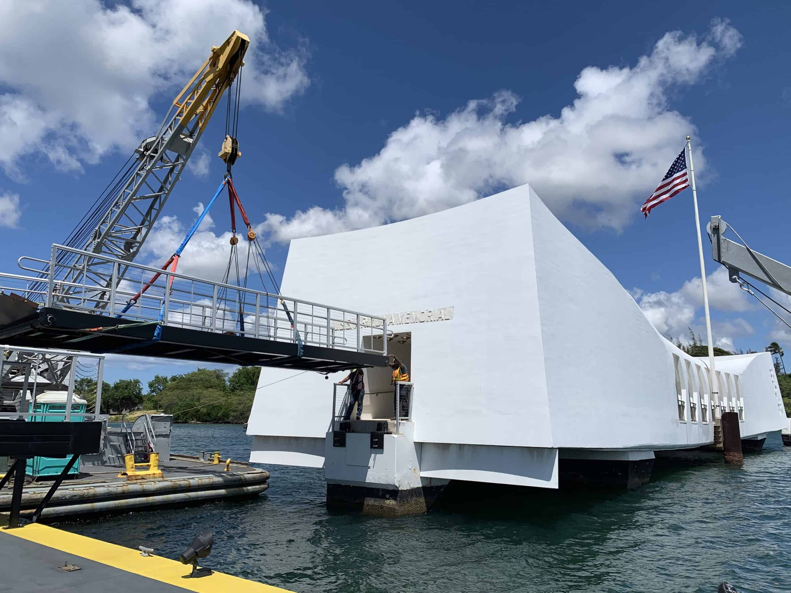 Photo of crane setting a bridge at the USS Arizona Memorial in Pearl Harbor, Hawaii